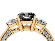 Fancy Black Cushion Cut Diamond Three-Stone Ring Set in Yellow gold with Round Side Stones and Pavé Band
