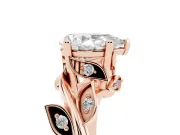 Pear Cut Diamond Solitaire Twist Engagement Ring Set in Rose gold with Pavé Leaf Accents