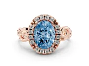 Fancy Blue Oval Cut Diamond Halo Ring Set in Rose gold with Scrollwork Band and Prong Setting
