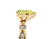 Fancy Yellow Pear Cut Diamond Solitaire Engagement Ring Set in Yellow gold with Milgrain Bezel Accent Band