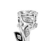 Oval Cut Diamond Solitaire Twist Engagement Ring Set in White gold with Pavé Leaf Accents