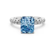 Fancy Blue Radiant Cut Diamond Pavé Solitaire Ring Set in Silver with Round Band and Prong Setting