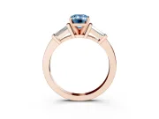 Fancy Blue Emerald Cut Diamond Solitaire Ring Set in Rose gold with Tapered Baguette Accents and Prong Setting