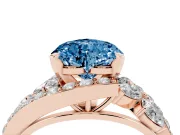 Fancy Blue Heart Cut Diamond Halo Ring Set in Rose gold with Marquise and Pavé Band in Prong Setting