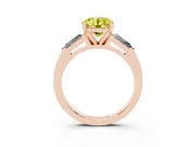 Fancy Yellow Round Cut Diamond Solitaire Ring Set in Rose gold with Tapered Baguette Side Stones and Prong Setting