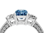 Fancy Blue Emerald Cut Diamond Three-Stone Ring Set in White gold with Round Side Stones and Pavé Band