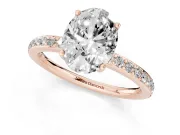 Oval Cut Diamond Pavé Band Ring Set in Rose gold with Prong-Set Center Stone