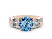 Fancy Blue Round Cut Diamond Engagement Ring Set in Rose gold with Baguette Side Stones and Channel Set Band