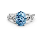 Fancy Blue Oval Cut Diamond Solitaire Leaf-Inspired Ring Set in Silver with Pavé Band and Prong Setting