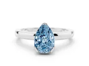 Fancy Blue Pear Cut Diamond Solitaire Ring Set in Platinum with Prong Head and Smooth Polished Band