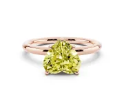 Fancy Yellow Heart Cut Diamond Solitaire Ring Set in Rose gold with Thin Band and Prong Setting