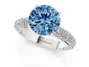 Fancy Blue Round Cut Diamond Solitaire Ring Set in Platinum with Prong Setting and Pavé-Set Band