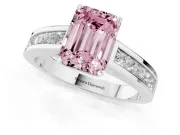 Fancy Pink Emerald Cut Diamond Solitaire Ring Set in Platinum with Channel-Set Band and Prong Setting