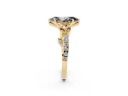 Fancy Black Marquise Cut Diamond Solitaire Leaf-Inspired Ring Set in Yellow gold with Pavé Band and Prong Setting