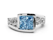 Fancy Blue Princess Cut Diamond Bezel Bypass Ring Set in Platinum with Round Accents
