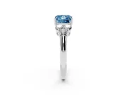 Fancy Blue Princess Cut Diamond Cluster Ring Set in Silver with Round Accent Stones and Prong Setting on a Plain Band