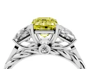 Fancy Yellow Emerald Cut Diamond Three-Stone Ring Set in White gold with Braided Band