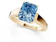 Fancy Blue Radiant Cut Diamond Solitaire Engagement Ring Set in Yellow gold with Prong Setting and Tapered Band