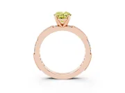 Fancy Yellow Oval Cut Diamond Solitaire Ring Set in Rose gold with Slim Pavé Band and Prong Setting
