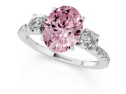 Fancy Pink Oval Cut Diamond Three-Stone Ring Set in Silver with Pavé Band and Graduated Sides
