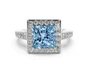 Fancy Blue Princess Cut Diamond Halo Pavé Engagement Ring Set in Platinum with Bezel Setting