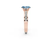Fancy Blue Oval Cut Diamond Solitaire Ring Set in Rose gold with Channel-Set Band and Prong Setting