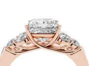 Princess Cut Diamond Cluster Ring Set in Rose gold with Round Accent Stones and Prong Setting on a Plain Band