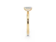 Emerald Cut Diamond Solitaire Ring Set in Yellow gold with Prong Setting on a Polished Plain Band