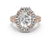 Oval Cut Diamond Halo Engagement Ring Set in Rose gold with Split Shank and Prong Setting