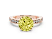Fancy Yellow Round Cut Diamond Solitaire Ring Set in Rose gold with Slim Pavé Band and Prong Setting