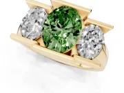 Fancy Green Oval Cut Diamond Three-Stone Channel Set Ring Set in Yellow gold with Smooth Polished Band