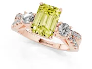 Fancy Yellow Emerald Cut Diamond Three-Stone Ring Set in Rose gold with Pavé Split Shank and Prong Setting