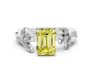 Fancy Yellow Emerald Cut Diamond Floral Vine Solitaire Engagement Ring Set in Platinum with Marquise Leaves