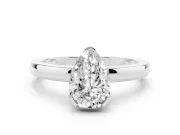 Pear Cut Diamond Solitaire Ring Set in Platinum with Prong Head and Smooth Polished Band