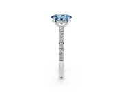 Fancy Blue Oval Cut Diamond Pavé Band Ring Set in White gold with Prong-Set Center Stone