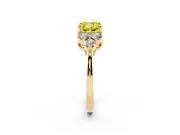Fancy Yellow Cushion Cut Diamond Solitaire Ring Set in Yellow gold with Cluster Accents on Each Side