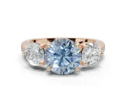 Round Three Stone Engagement Ring Setting for a Fancy Blue Lab-Grown Diamond | Tapered Pave Band | Rose Gold