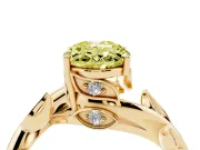 Fancy Yellow Oval Cut Diamond Solitaire Twist Engagement Ring Set in Yellow gold with Pavé Leaf Accents