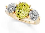 Fancy Yellow Oval Cut Diamond Three-Stone Ring Set in Yellow gold with Prong Setting and Classic Band