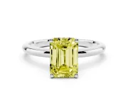 Fancy Yellow Emerald Cut Diamond Solitaire Engagement Ring Set in White gold with Prong Setting and Polished Band