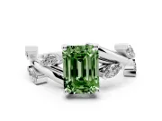 Fancy Green Emerald Cut Diamond Solitaire Ring Set in Platinum with Twisted Marquise Accent Band