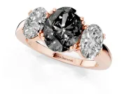 Fancy Black Oval Cut Diamond Three-Stone Ring Set in Rose gold with Polished Band and Prong Setting