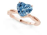 Fancy Blue Heart Cut Diamond Solitaire Ring Set in Rose gold with Twisted Band and Bead Prong Setting