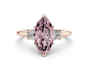 Fancy Pink Three-Stone Marquise Cut Diamond Ring Set in Rose gold with Prong Setting and Plain Band