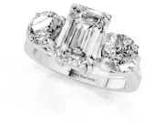 Emerald Cut Diamond Three-Stone Ring Set in Platinum with Round Accent Stones and Plain Band