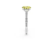 Fancy Yellow Oval Cut Diamond Pavé Band Ring Set in Platinum with Prong-Set Center Stone