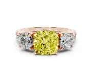 Fancy Yellow Cushion Cut Diamond Three-Stone Ring Set in Rose gold with Pavé Band