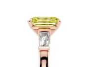 Fancy Yellow Emerald Cut Diamond Solitaire Ring Set in Rose gold with Tapered Baguette Accents and Prong Setting