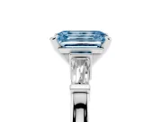 Fancy Blue Emerald Cut Diamond Solitaire Ring Set in Silver with Tapered Baguette Accents and Prong Setting