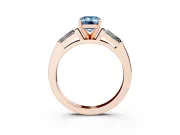 Fancy Blue Emerald Cut Diamond Solitaire Ring Set in Rose gold with Tapered Baguette Side Stones and Prong Setting
